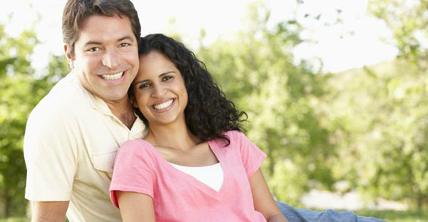 Young couple, smiling